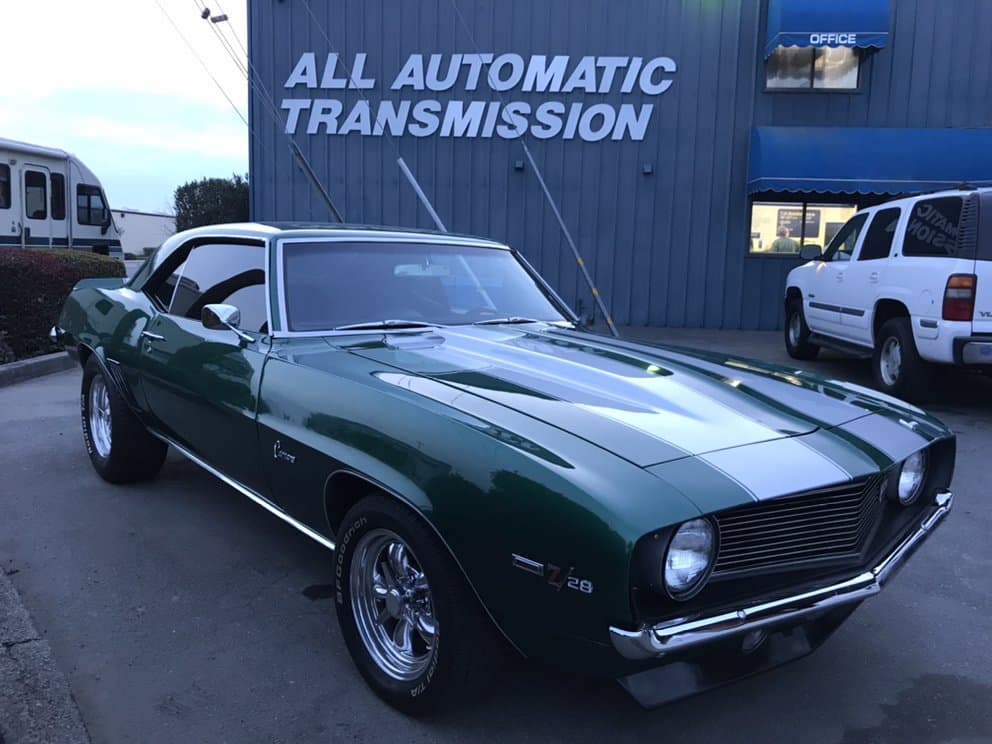 A green 1969 Camaro Z/28 outside the All Automatic Transmission office